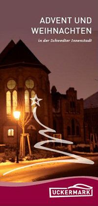 Das Titelbild zeigt eine beleuchtete Kirche am Abend.