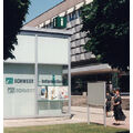 Foto: Bürohaus-Anbau mit Schwedt-Information-Beschriftung