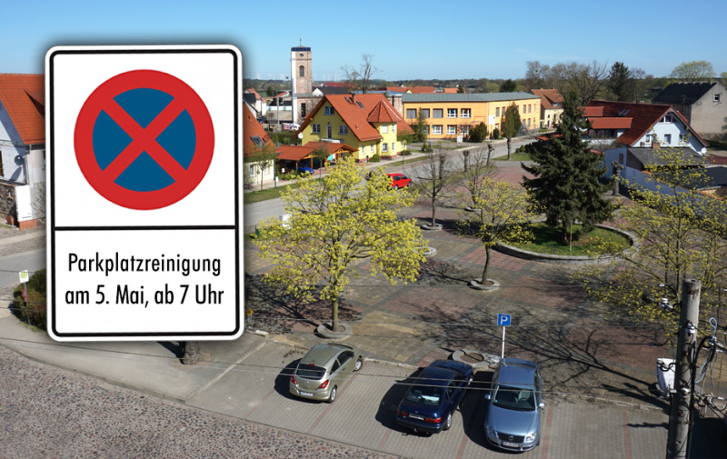 Foto: Straßenbild mit parkenden Autos und Halteverbotsschild